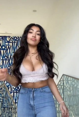 Irresistible Jackie Ybarra Shows Cleavage in Grey Top