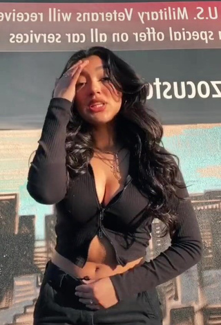 Gorgeous Jackie Ybarra Shows Cleavage in Alluring Black Crop Top