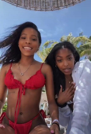 Captivating Jada Wesley in Red Bikini at the Beach