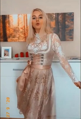 3. Erotic Jellina Häuser Shows Cleavage in Dress