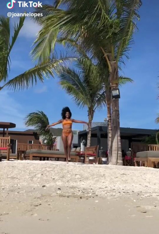 1. Erotic Joanne Lopes in Orange Bikini at the Beach