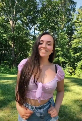 1. Irresistible Julia Raleigh Shows Cleavage in Purple Crop Top