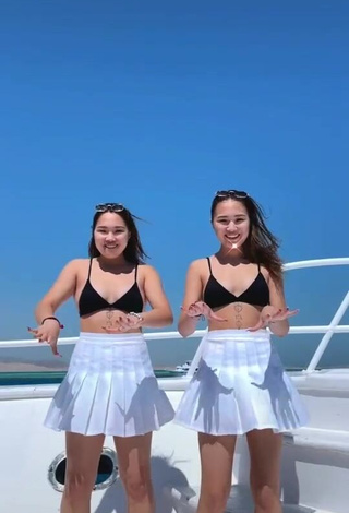 Erotic Tomiris & Nargiz Kanatova in Black Bikini Top on a Boat