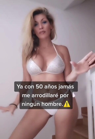 1. Erotic Lidia Shows Cleavage in White Bikini