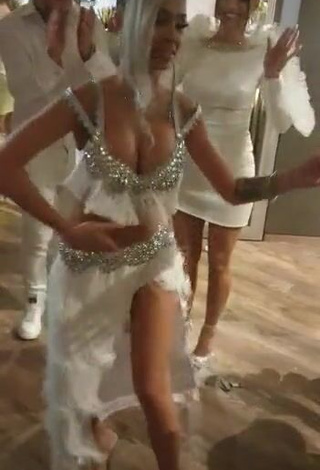 1. Hot Cristina Pucean Shows Cleavage in White Crop Top