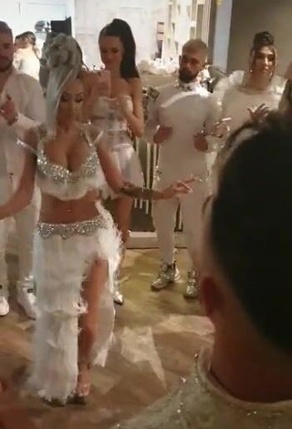 Hot Cristina Pucean Shows Cleavage in White Crop Top