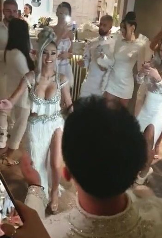 3. Hot Cristina Pucean Shows Cleavage in White Crop Top