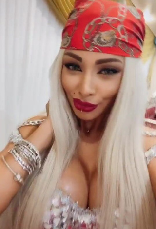 Cristina Pucean Shows her Seductive Cleavage