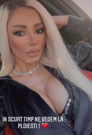 1. Sensual Cristina Pucean Shows Cleavage in a Car