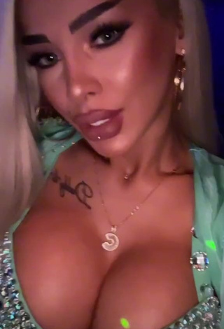 1. Cristina Pucean Shows her Hot Cleavage