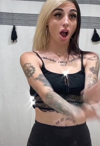 1. Lovely Cruella Morgan in Black Crop Top