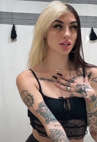 3. Lovely Cruella Morgan in Black Crop Top