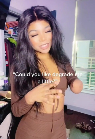 1. Hot Destinee Faire Shows Cleavage in Brown Crop Top