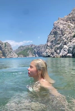 1. Captivating Elisa in Bikini in the Sea (Side Boob)