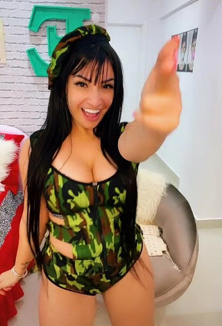 Erotic Emanuelly Raquel Shows Cleavage in Camouflage Swimsuit and Bouncing Boobs