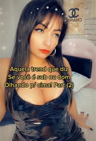 3. Erotic Emanuelly Raquel Shows Cleavage in Dress