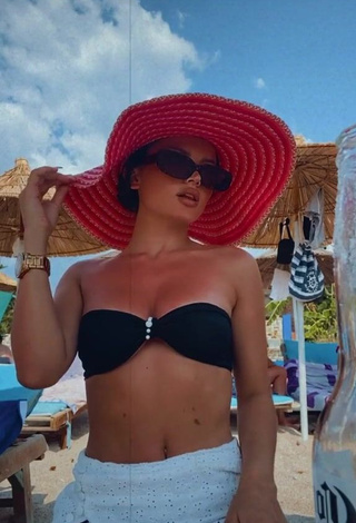 1. Erotic Grisela Shows Cleavage in Black Bikini Top at the Beach