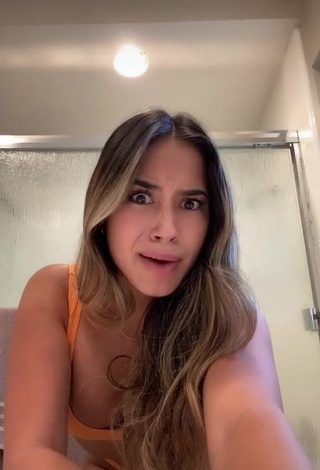 1. Irresistible Jasmin Acosta Shows Cleavage in Orange Bikini