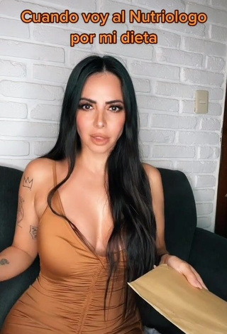 Irresistible Jimena Sánchez Shows Cleavage in Brown Dress