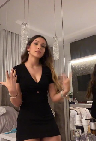 3. Erotic Julia Alves Shows Cleavage in Black Dress