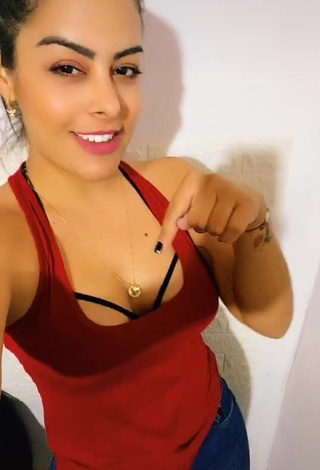 3. Irresistible Larissa Riquelme Shows Cleavage in Red Top