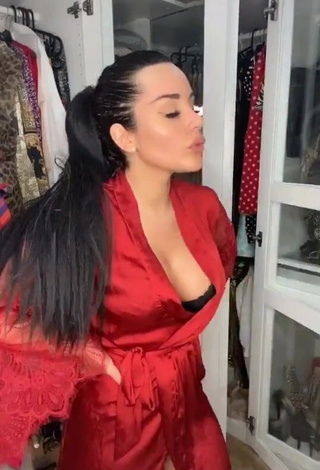 1. Erotic Laura Lempika Shows Cleavage in Red Bathrobe