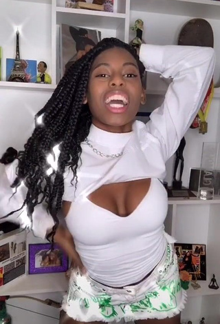 Sweetie MC Soffia Shows Cleavage in White Crop Top