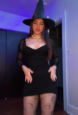 1. Erotic Naomi in Black Dress