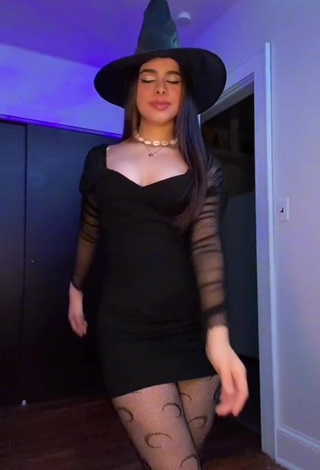 Erotic Naomi in Black Dress