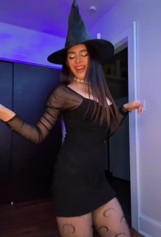 3. Erotic Naomi in Black Dress