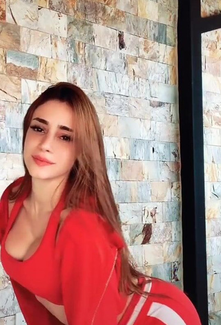 Beautiful Poleth Villalba Shows Cleavage in Sexy Red Crop Top