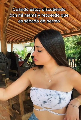 Erotic Poleth Villalba Shows Cleavage in Bikini Top