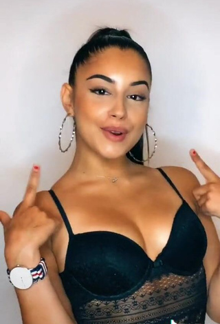 Erotic Sofia Chawki Shows Cleavage in Black Top and Bouncing Breasts