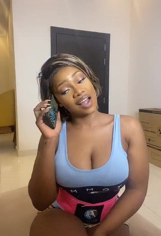 2. Irresistible Tacha Shows Cleavage in Blue Crop Top