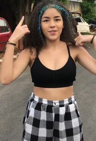 3. Erotic Mily in Black Crop Top in a Street