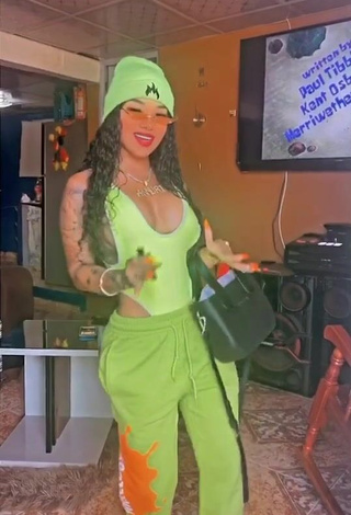 Erotic Anyuri Lozano Shows Cleavage in Lime Green Swimsuit