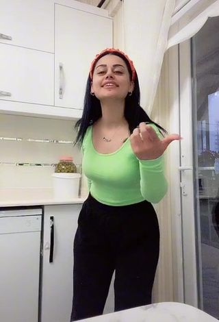 3. Erotic Arzu Kalkan in Green Crop Top
