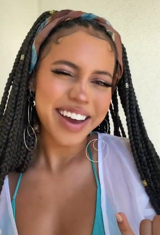 Irresistible Asia Monet Ray Shows Cleavage in Turquoise Bikini Top