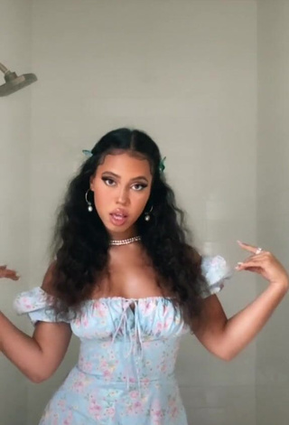 Erotic Asia Monet Ray Shows Cleavage in Floral Dress