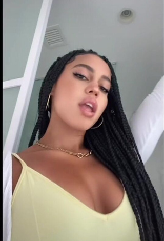 Irresistible Asia Monet Ray Shows Cleavage in Yellow Top