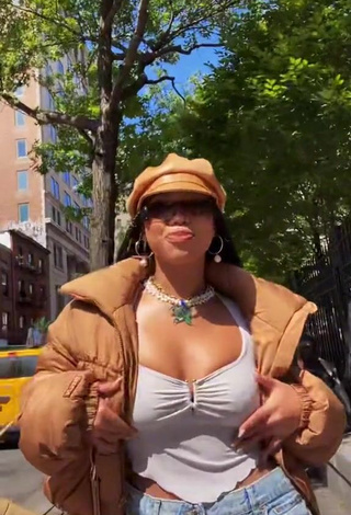 2. Beautiful Asia Monet Ray Shows Cleavage in Sexy White Top in a Street