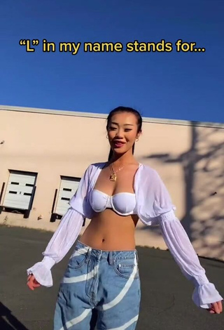 Erotic Char in Bra in a Street