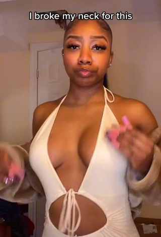 1. Erotic Benita Jadah Shows Cleavage in White Dress and Bouncing Tits