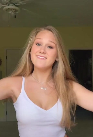 Irresistible Caiti Mackenzie Shows Cleavage in White Crop Top