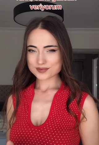 1. Irresistible Ceylan Shows Cleavage in Red Top