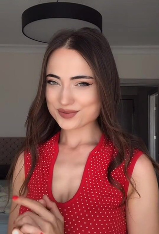 Irresistible Ceylan Shows Cleavage in Red Top