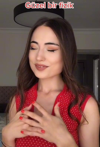 3. Irresistible Ceylan Shows Cleavage in Red Top