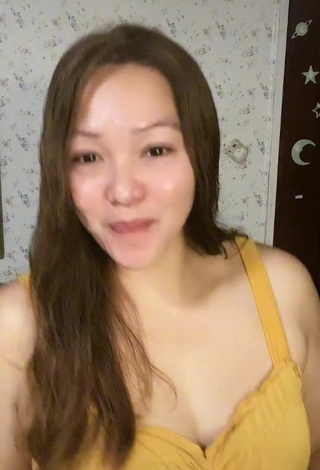 1. Erotic Cherryfloresyebro Shows Cleavage in Yellow Top