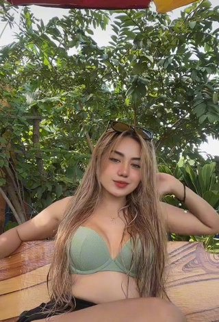 Irresistible Eaaayyy Shows Cleavage in Olive Bikini Top