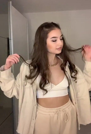 1. Erotic Eva Bordianu Shows Cleavage in White Crop Top and Bouncing Boobs